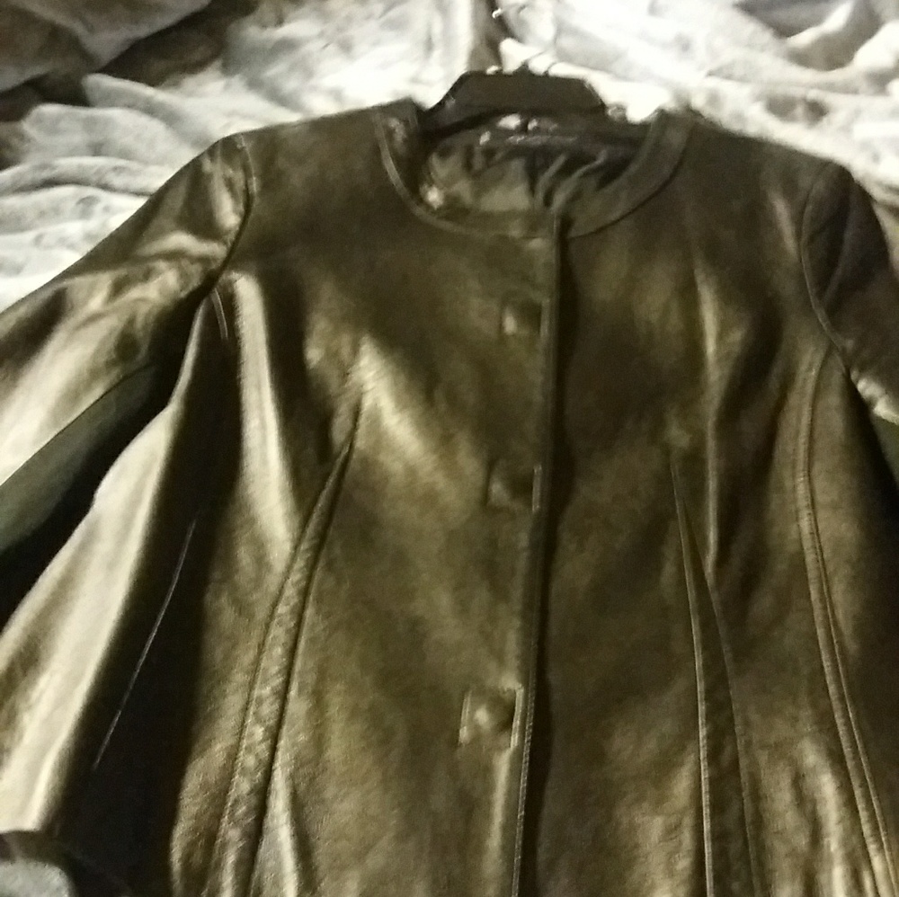 Leather classy jacket,stretch fabric under arms.